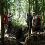 Photo of Dev Randhawa inspecting trenches